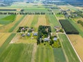Abstract geometric shapes of agricultural parcels of different crops in yellow and green colors. Aerial view shoot from drone Royalty Free Stock Photo