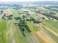 Abstract geometric shapes of agricultural parcels of different crops in yellow and green colors. Aerial view shoot from drone Royalty Free Stock Photo