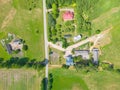 Abstract geometric shapes of agricultural parcels of different crops in yellow and green colors. Aerial view shoot from drone Royalty Free Stock Photo