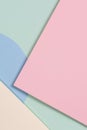 Abstract geometric texture background of fashion soft green, pastel pink, light blue, yellow color paper. Top view. Royalty Free Stock Photo