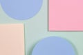 Abstract geometric texture background of soft green, pastel pink, light blue, yellow color paper. Top view, flat lay Royalty Free Stock Photo