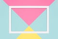 Abstract geometrical pastel blue, pink and yellow paper flat lay background. Minimalism, geometry and symmetry template. Royalty Free Stock Photo