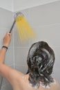 Girl Stands With Silver Shower and Long Pasta Spaghetti like Water Jet