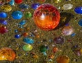 abstract glass. glass balls on the ground, multicolored , shards, broken