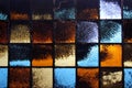 Abstract glass wall with blue and yellow metalic squares ocher black and gray shadows Royalty Free Stock Photo