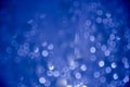 Abstract glitter blue bokeh background Royalty Free Stock Photo