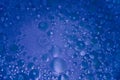 Abstract glitter blue bubbles bokeh background Royalty Free Stock Photo