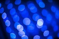 Abstract glitter defocused blue lights bokeh texture on black background Royalty Free Stock Photo