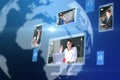 Abstract globe map with computer screens and creative video conference call between attractive young european businesspeople. Royalty Free Stock Photo