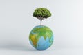 Abstract globe with tree on white background. World, earth, ecology and planet concept. Royalty Free Stock Photo