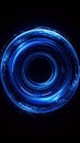 Abstract Glowing Blue Circular Light Particle Tunnel on Dark Background Royalty Free Stock Photo