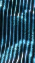 Abstract glowing blue vertical light streams representing digital flow, data transmission, and futuristic technology Royalty Free Stock Photo