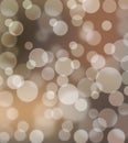 Abstract glowing Bokeh background in brown shades Royalty Free Stock Photo