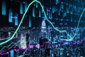 Abstract glowing forex graph on night city background with candlestick. Invest, trade and broker concept. Double exposure Royalty Free Stock Photo