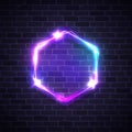 Abstract glowing hexagon background on brick wall.