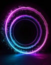 Abstract glowing neon rings and particles with blue and pink light effects on dark background Royalty Free Stock Photo