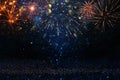 abstract gold, black and blue glitter background with fireworks. christmas eve, 4th of july holiday concept. Royalty Free Stock Photo