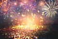 Abstract gold, black and blue glitter background with fireworks. christmas eve, 4th of july holiday concept Royalty Free Stock Photo