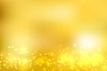 Abstract gold blurred background with bokeh and gold glitter foo Royalty Free Stock Photo