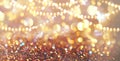 Abstract gold bokeh background. Golden holiday glowing backdrop. Defocused Background With Blinking Stars Royalty Free Stock Photo