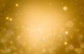 Abstract gold bokeh defocused glitter texture christmas with light bokeh background Royalty Free Stock Photo