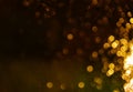 Abstract of gold bokeh of rains water on glasses ,defocused lights glitter background.Background decorative christmas ,happy new Royalty Free Stock Photo