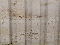 Abstract gold color painted on grunge rough surface of stucco concrete wall. Golden texture background and wallpaper Royalty Free Stock Photo
