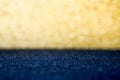 Abstract gold and dark blue sparkling bokeh wall and floor background studio.luxury holiday backdrop mock up for display
