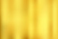 Abstract gold gredient metal color theme satin texture background. Lighting effects of flash. Blurred vector background with light Royalty Free Stock Photo
