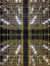 Abstract gold grid with backlight, vivid perspective symmetrical image, art deco pattern Royalty Free Stock Photo