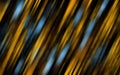 Abstract golden and blue bokeh circles on black background. Royalty Free Stock Photo