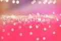 Abstract Golden Bokeh And Small Bokeh Line At Centre With Blurry Pink Gradient Background Royalty Free Stock Photo