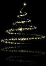 Abstract golden christmas tree with reflection on black background Royalty Free Stock Photo