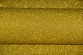 Abstract golden glitter defocused background with copy space, go