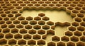 Abstract golden honeycomb structure with hexagonal pattern and depth effect Royalty Free Stock Photo