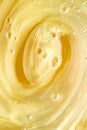 Abstract golden liquid background, paint splash, swirl pattern and water drops, beauty gel and cosmetic texture Royalty Free Stock Photo