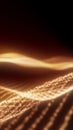 Abstract golden particle waves flowing softly across a dark background with warm light Royalty Free Stock Photo