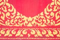 Abstract golden pattern on red wall Royalty Free Stock Photo