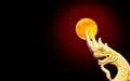 Abstract golden serpent head in in the moonlight.