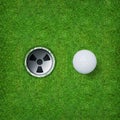 Abstract golf sport background of golf ball and golf hole on green grass background. Royalty Free Stock Photo