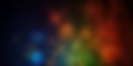 Abstract gradient background blending deep shades of blue, red, green, and yellow, creating a vibrant and dynamic atmosphere.