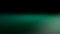 Abstract gradient of deep black transitioning to a vibrant emerald green with subtle light diffusion Royalty Free Stock Photo