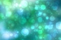 Abstract gradient green light turquoise blue shiny blurred background texture with circular bokeh lights in soft color style. Royalty Free Stock Photo