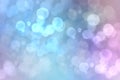 Abstract gradient of light blue pink pastel background texture with glowing circular bokeh lights. Beautiful colorful spring or Royalty Free Stock Photo