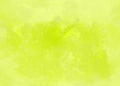 Abstract gradient yellow lime green bright brush aquarelle painted background textured with distressed stains Royalty Free Stock Photo