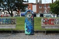 European city. Abstract graffiti on trash and park benches. Vandalism in Dublin's public parks.