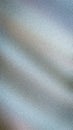 Abstract grainy background featuring a sleek silver, grey, and light blue gradient with a blurred noise texture perfect for modern Royalty Free Stock Photo