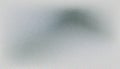 Abstract grainy texture with soft gradient darkening effect creating a subtle noise pattern, ideal for backgrounds, overlays, and Royalty Free Stock Photo