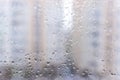 Abstract gray background of raindrops on glass Royalty Free Stock Photo