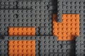 Abstract gray orange background from lego children designer